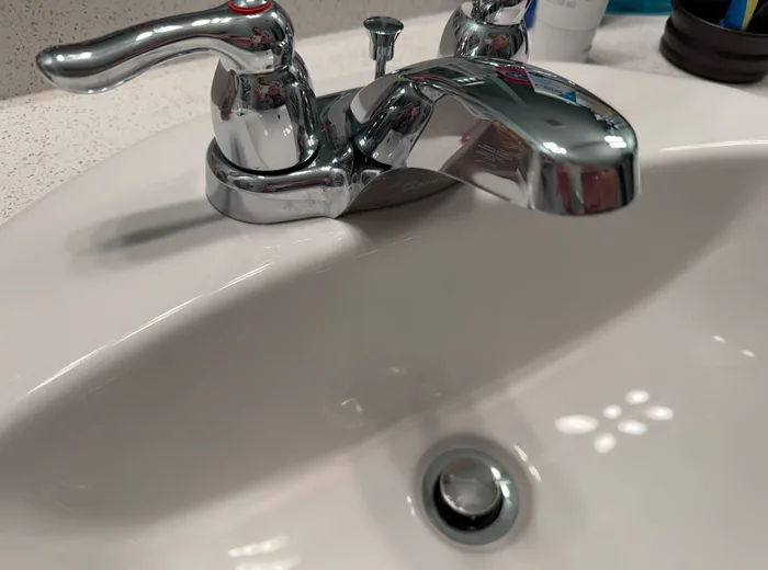 Polished chrome bathroom faucet: after cleaning