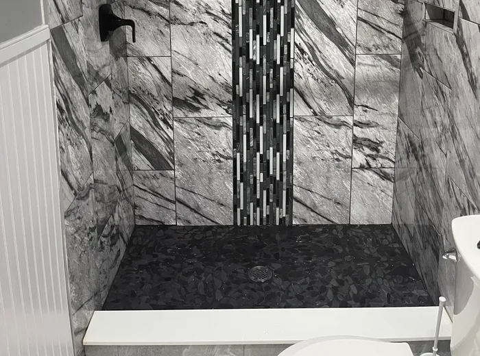 Marble shower detailed during a one-time clean