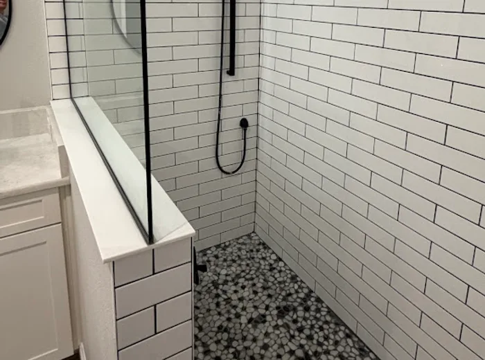 White subway tile shower left spotless