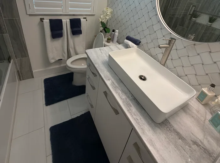 Bathroom vanity and vessel sink after cleaning